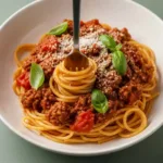 one pot spaghetti finished plated bowl parmesan basil